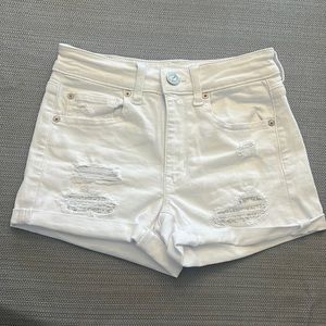 American Eagle white jean shorts with flower laced rips
